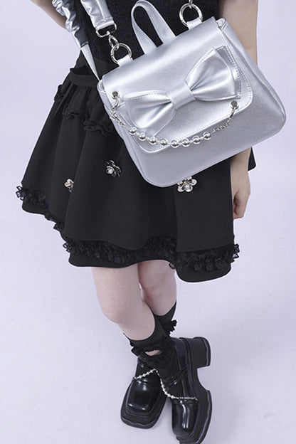 Silver Bow Crossbody Backpack