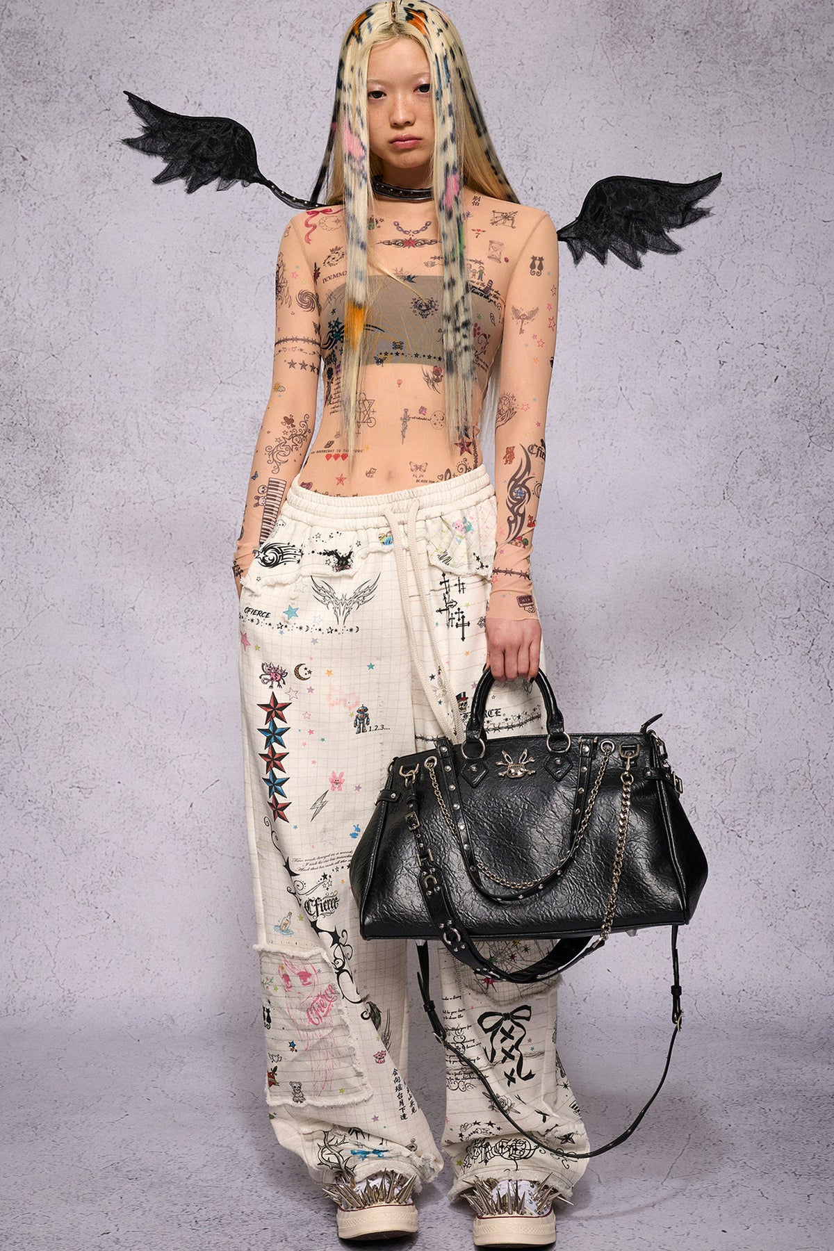 Torn Manuscript Fragmented Sweatpants
