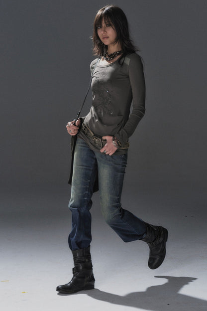 Top in mesh bicolore con strass