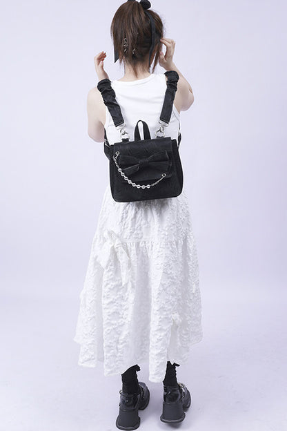 Silver Bow Crossbody Backpack