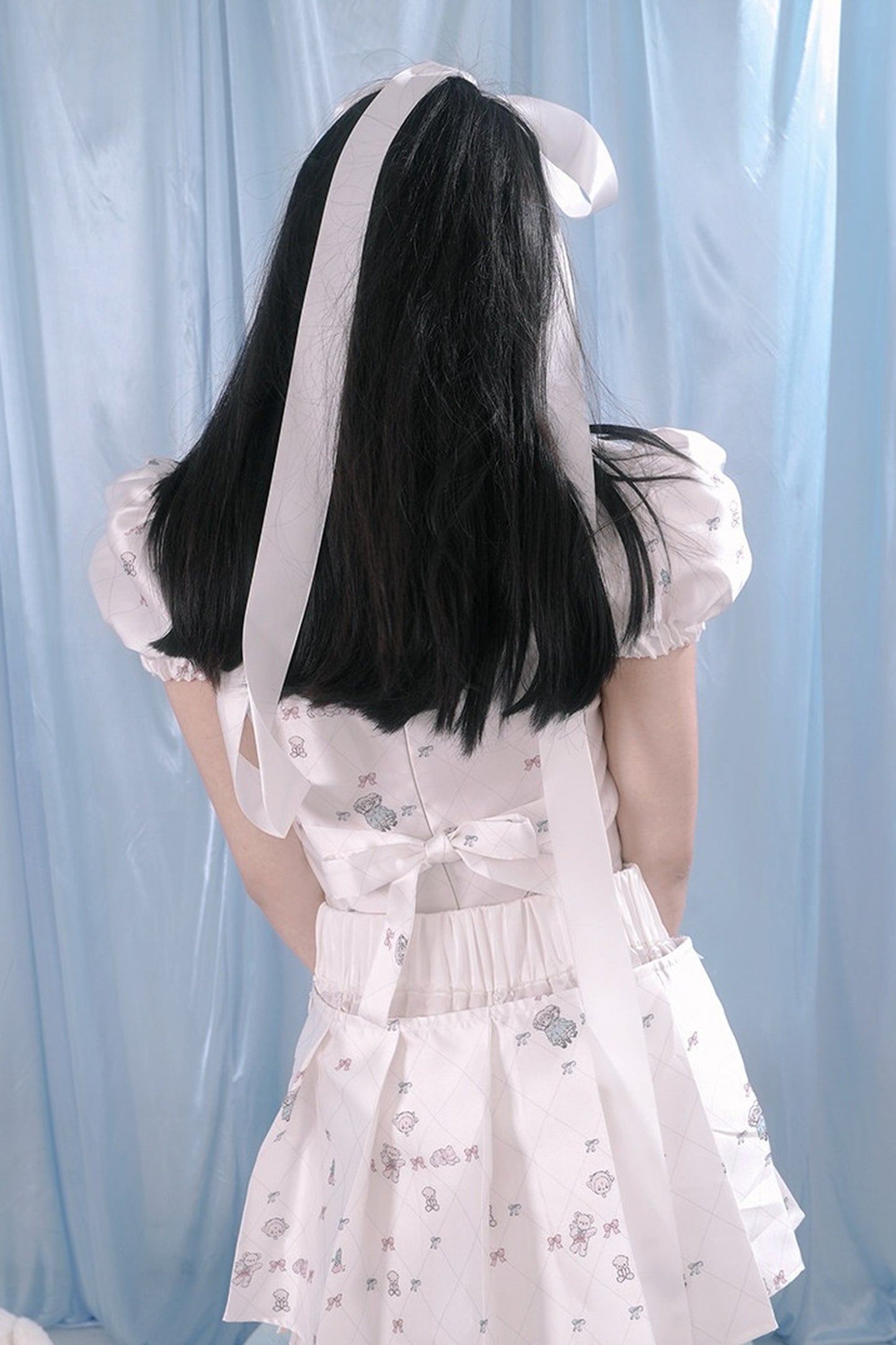 Blusa con stampa angeli e maniche a sbuffo