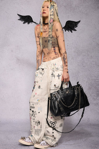Torn Manuscript Fragmented Sweatpants