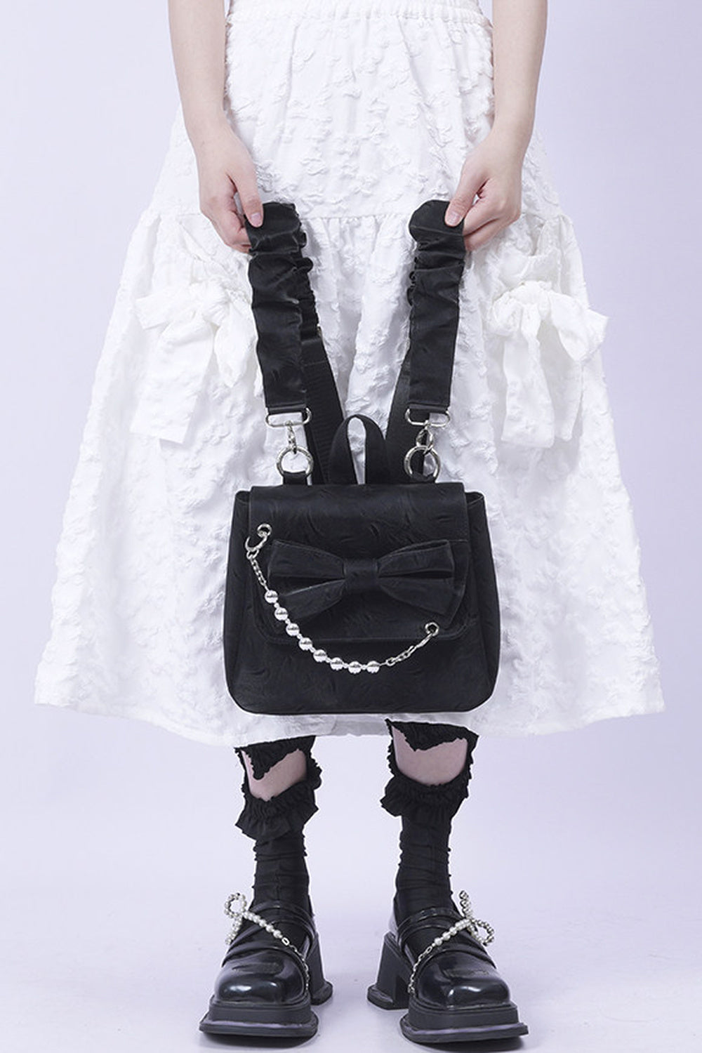 Silver Bow Crossbody Backpack
