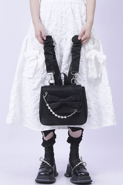Silver Bow Crossbody Backpack