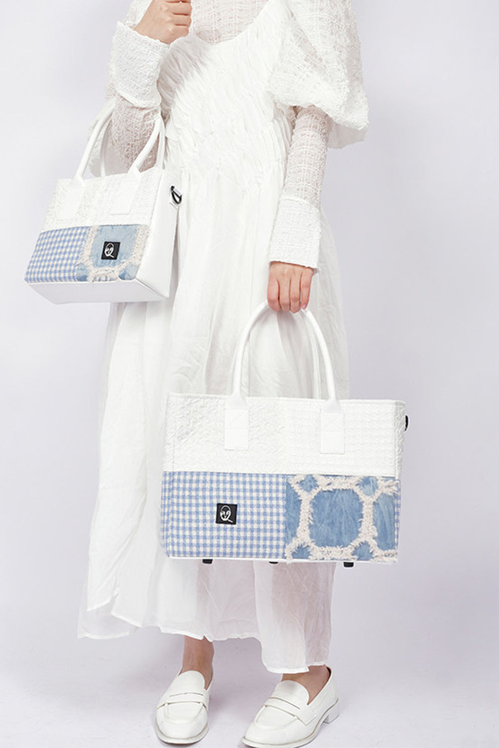 Borsa tote quadrata piccola a toppe con cuciture