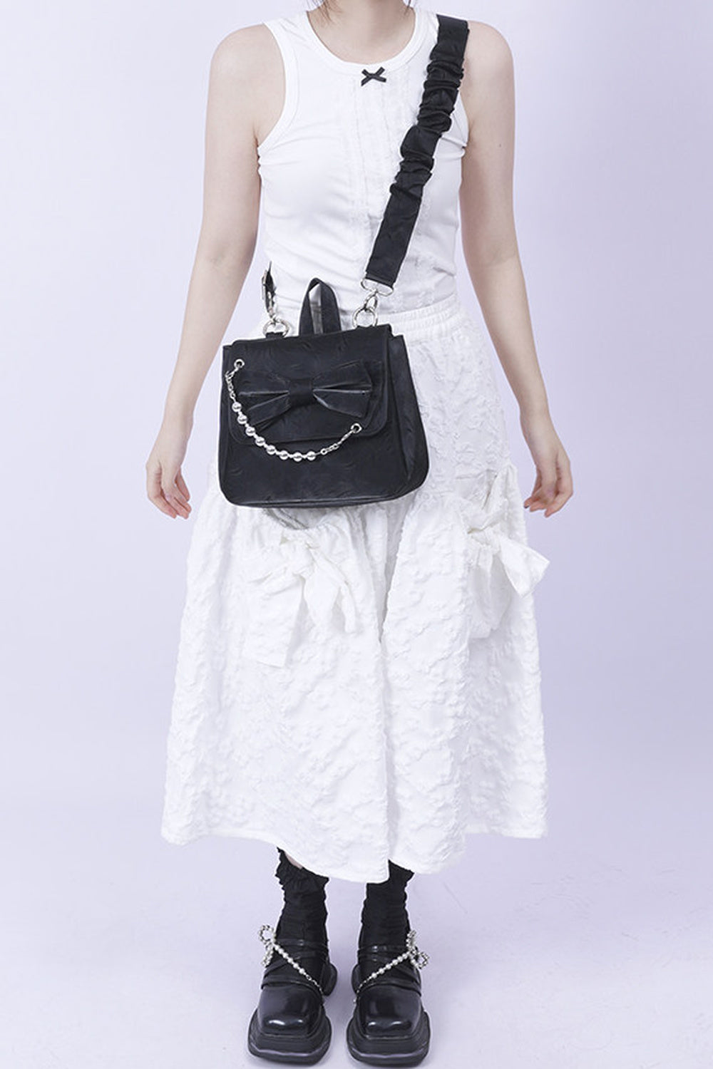 Silver Bow Crossbody Backpack