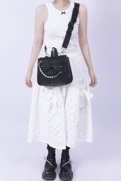 Silver Bow Crossbody Backpack