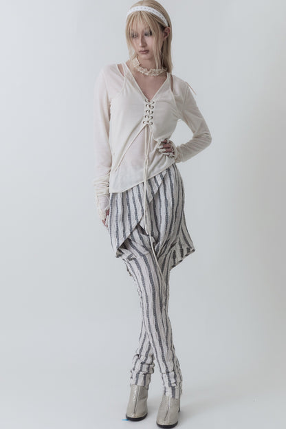 Blusa ricamata con orlo irregolare