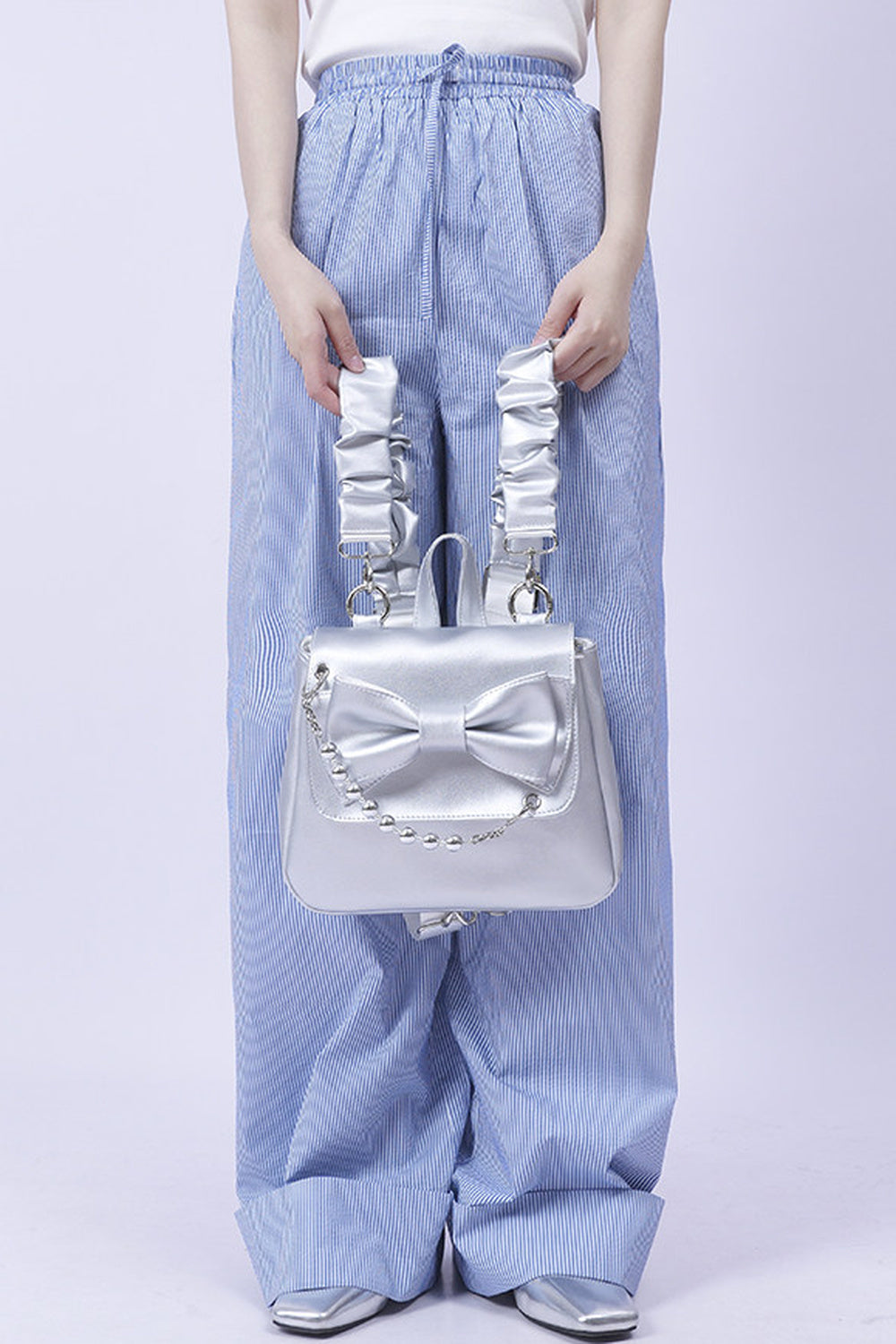 Silver Bow Crossbody Backpack