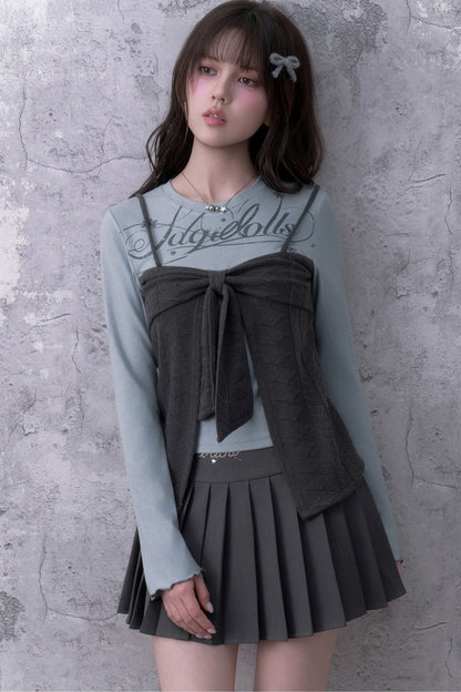Blusa a maniche lunghe blu-grigia con fiocco e effetto a strati