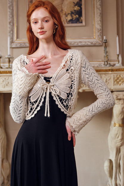 Schwarzes langärmeliges Strickkleid