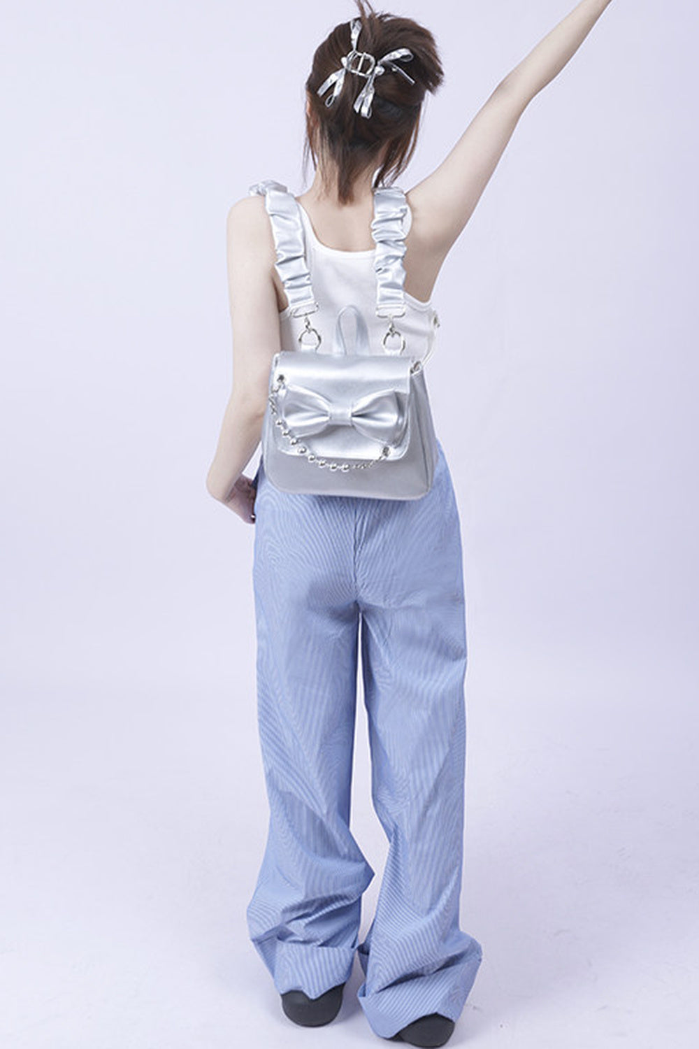 Silver Bow Crossbody Backpack