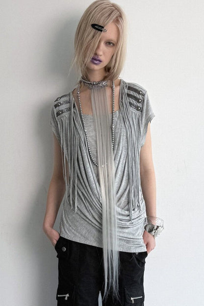 Top in maglia drappeggiato con nappine
