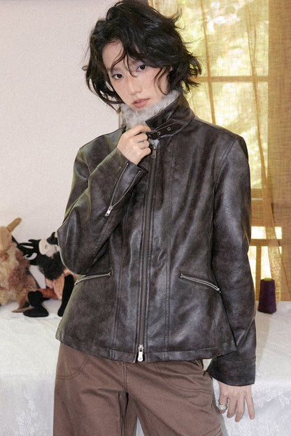 Jacke aus Kunstleder mit Used-Patchwork und Pelzkragen