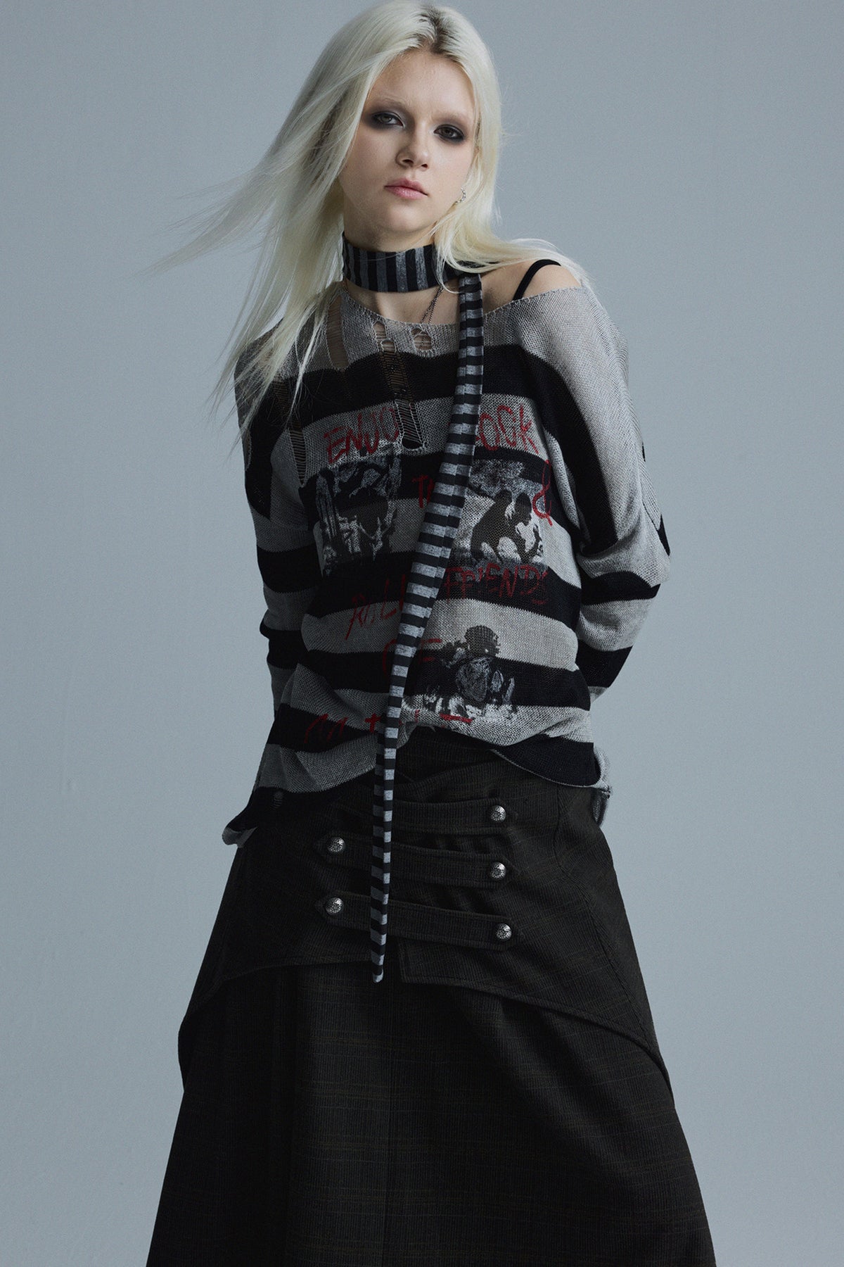 Top in maglia a righe punk a maniche lunghe