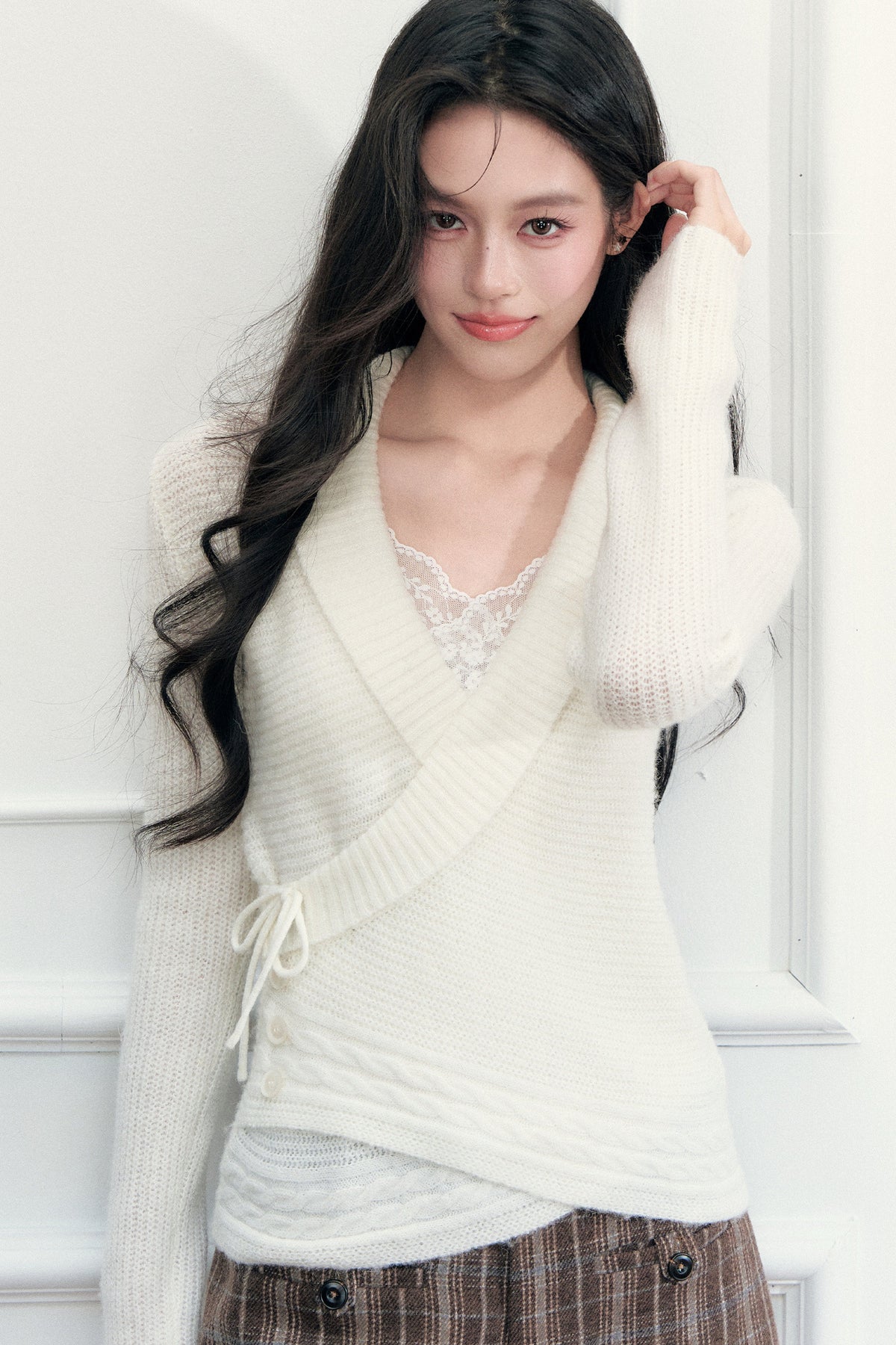 Top in maglia con scollo a V e bavero incrociato