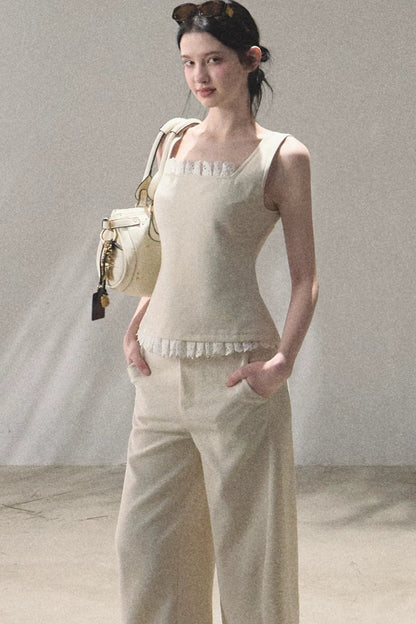 Set coordinato gilet e pantaloni in lino con inserti in pizzo