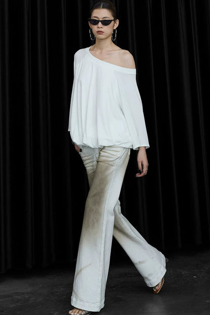 Blusa floreale con maniche a sbuffo e spalle scoperte