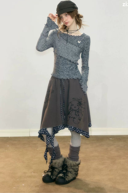 Strickoberteil mit Rüschenbesatz und Glockenärmeln