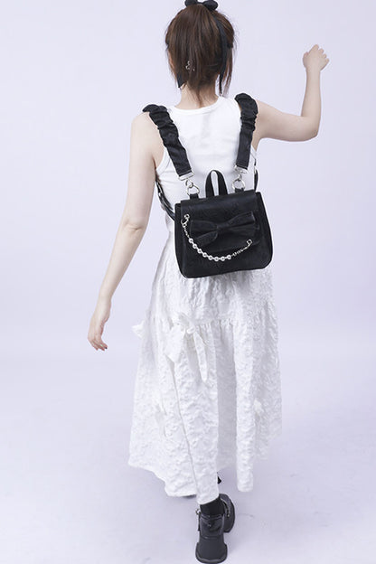 Silver Bow Crossbody Backpack
