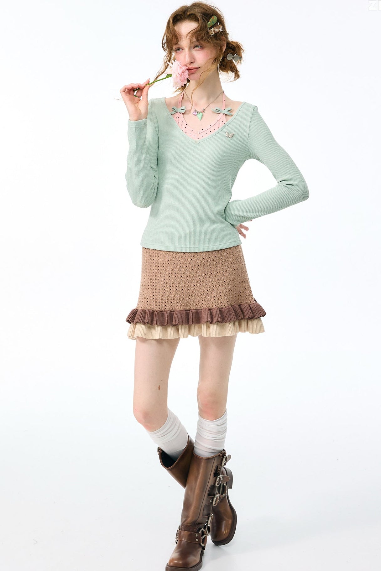 Top a maglia a maniche lunghe con farfalle e pois