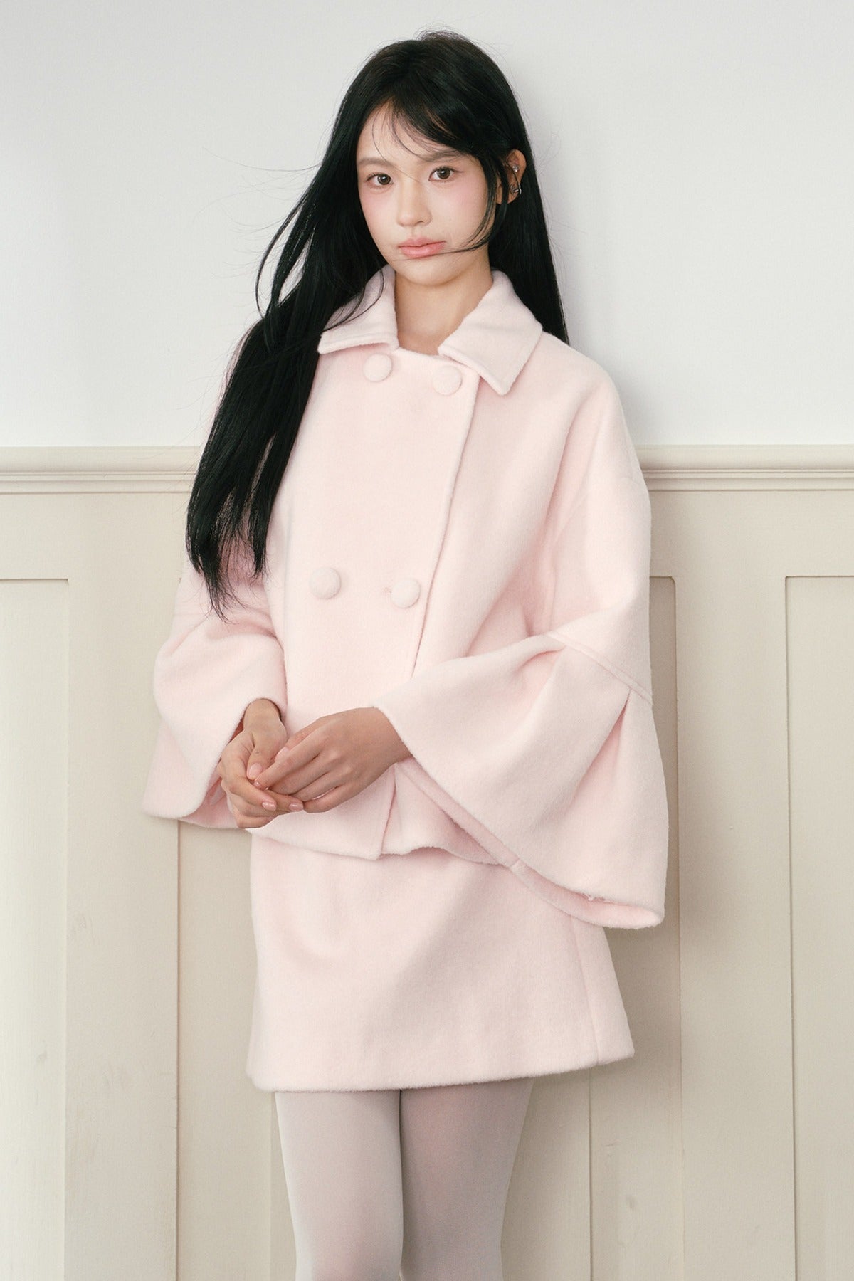Completo cappotto e gonna in lana rosa