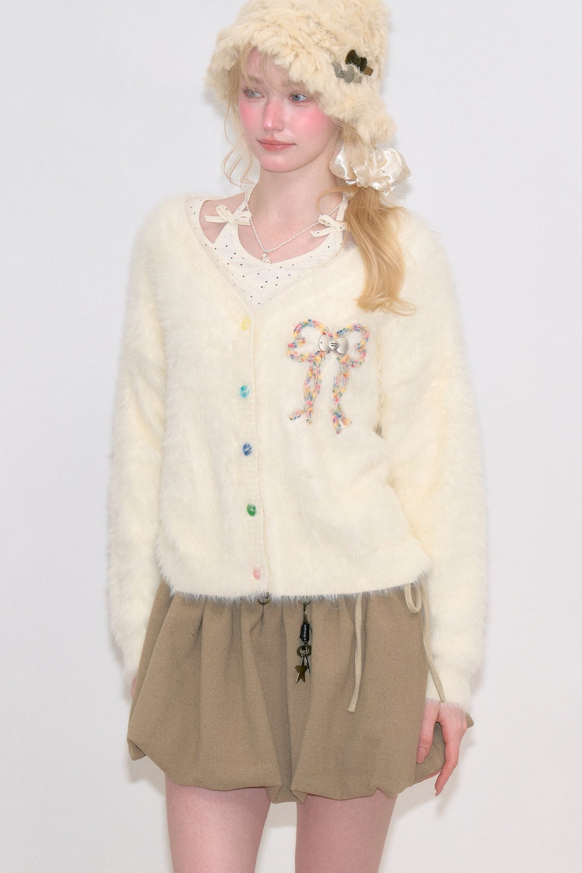Apricotfarbene Strickjacke mit Schleife