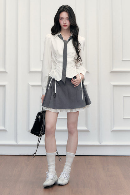 Ensemble blouse à nœud coulissant et jupe