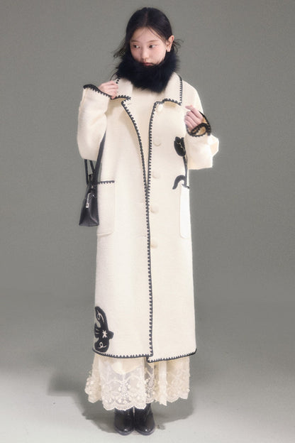 Cappotto lungo in lana ricamato con collo a scialle a tulipano