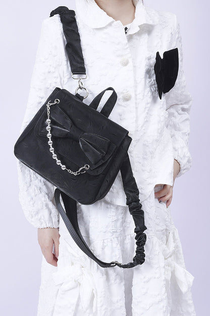 Silver Bow Crossbody Backpack