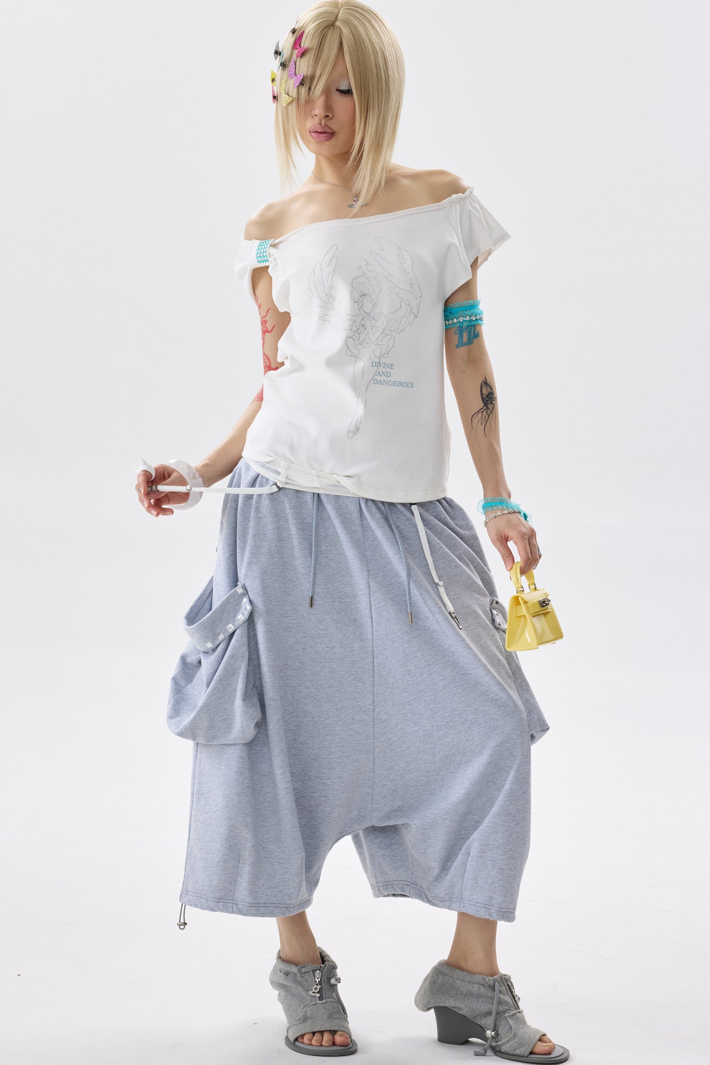 Pantalon de survêtement à carreaux avec empiècements et strass