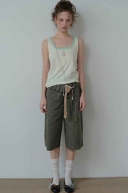 Pantaloni cropped a vita alta con orlo plissettato staccabile