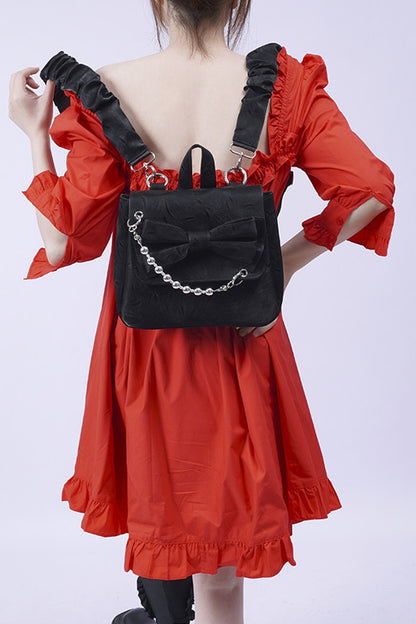 Silver Bow Crossbody Backpack