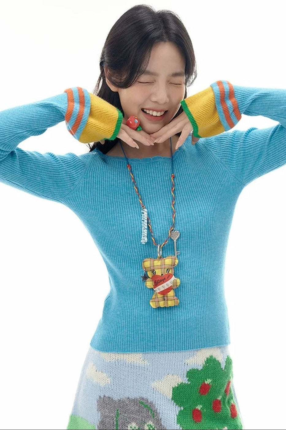 Collier long avec pendentif ours à carreaux