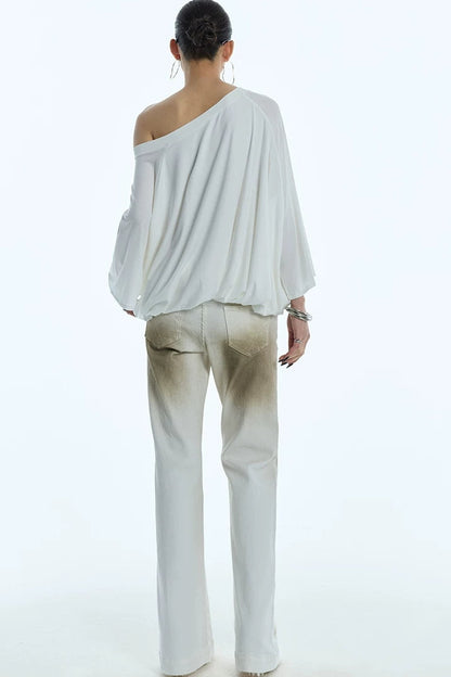 Blusa floreale con maniche a sbuffo e spalle scoperte