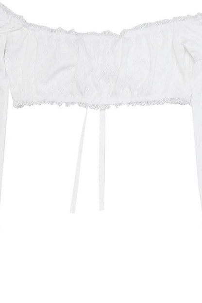 Top in maglia con pizzo a forma di cuore