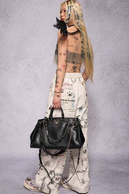 Torn Manuscript Fragmented Sweatpants