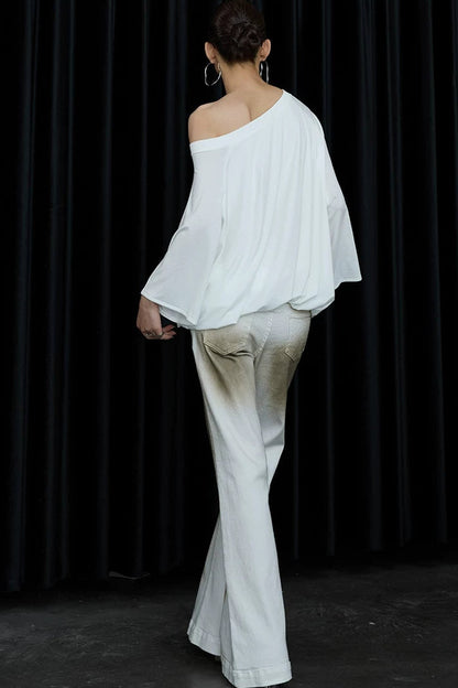 Blusa floreale con maniche a sbuffo e spalle scoperte