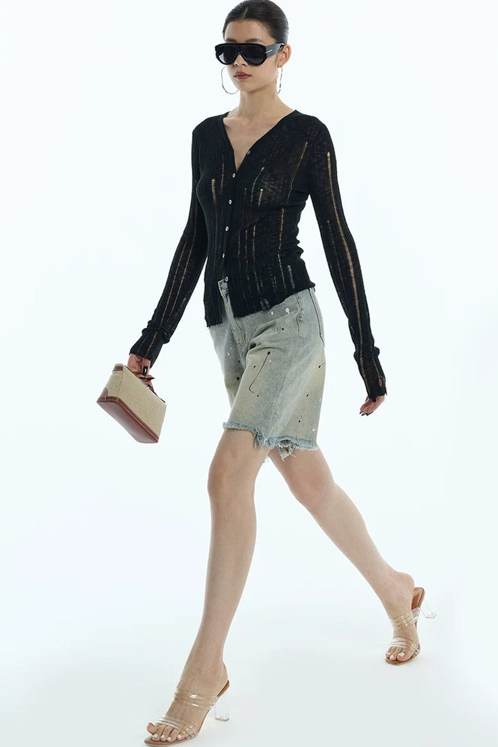 Cardigan en maille noir rayé à découpes