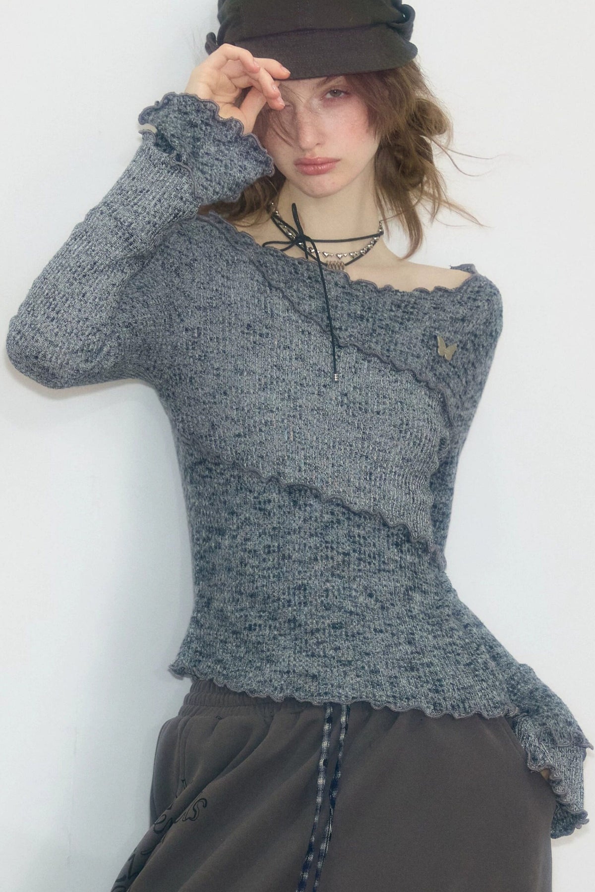 Strickoberteil mit Rüschenbesatz und Glockenärmeln