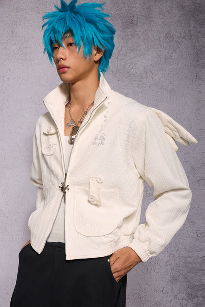 Jacke mit Patchwork-Strasssteinen und Engelsflügeln
