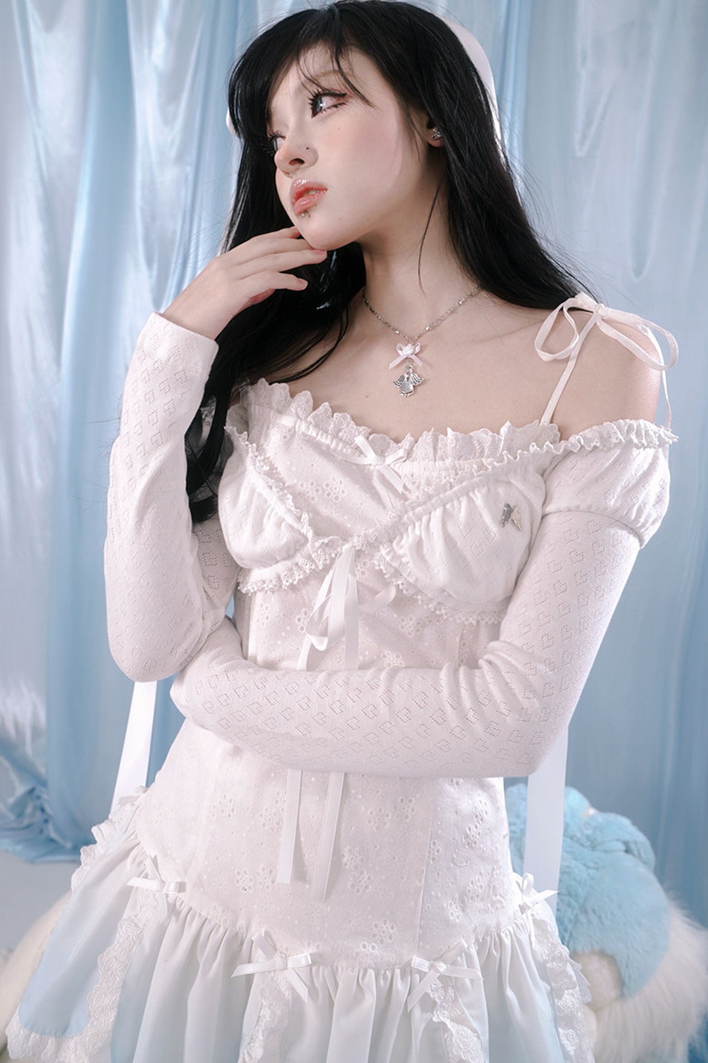 Top in maglia con pizzo a forma di cuore