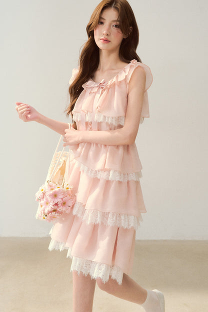 Robe rose à volants superposés en dentelle cils avec nœud