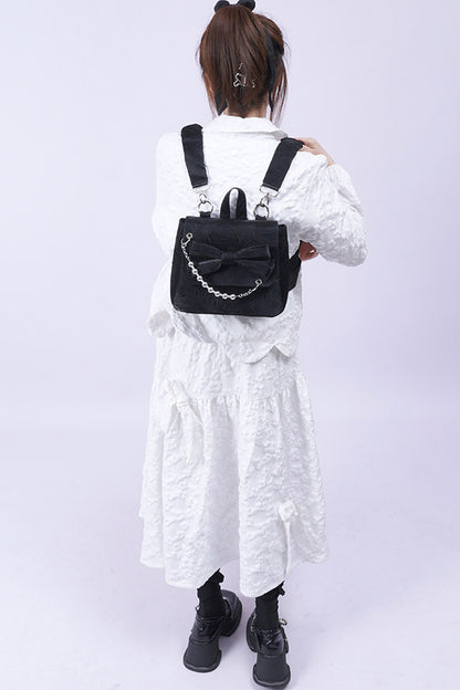 Silver Bow Crossbody Backpack