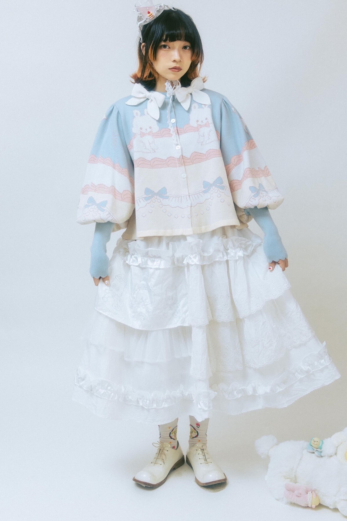 Cardigan a maglia con fiocco e coniglio