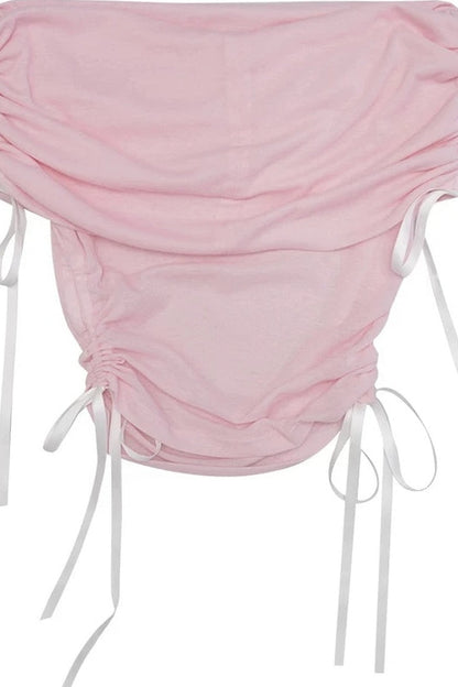 Top con spalle scoperte, volant e fiocco