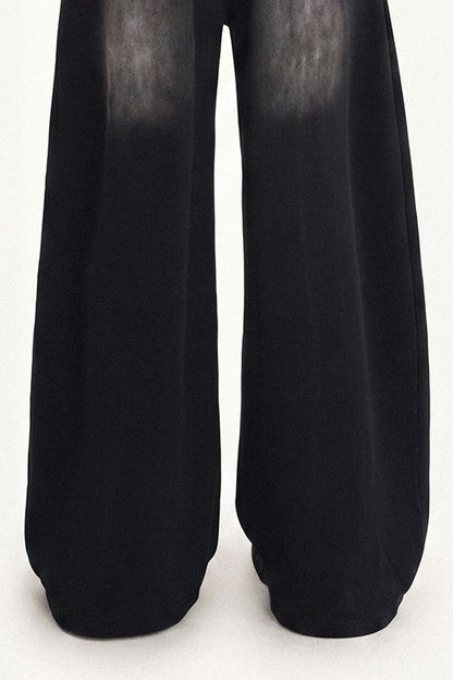 Pantaloni sportivi a gamba larga con stampa grafica