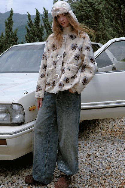 Gesteppte Fleecejacke mit Blumen und Schleife