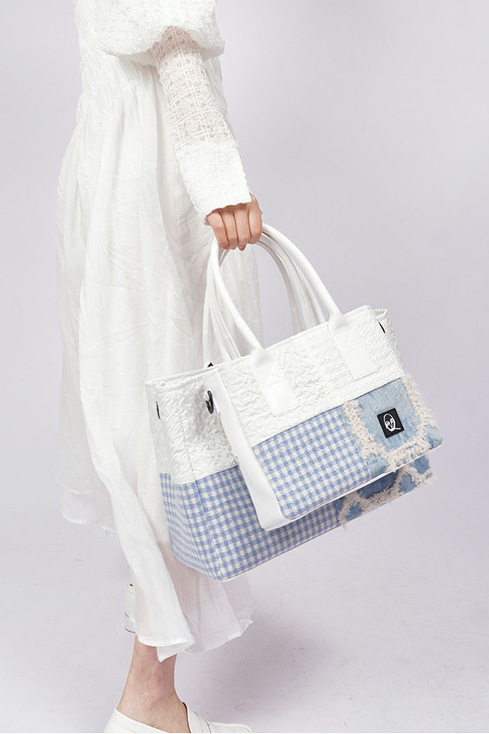 Borsa tote quadrata piccola a toppe con cuciture