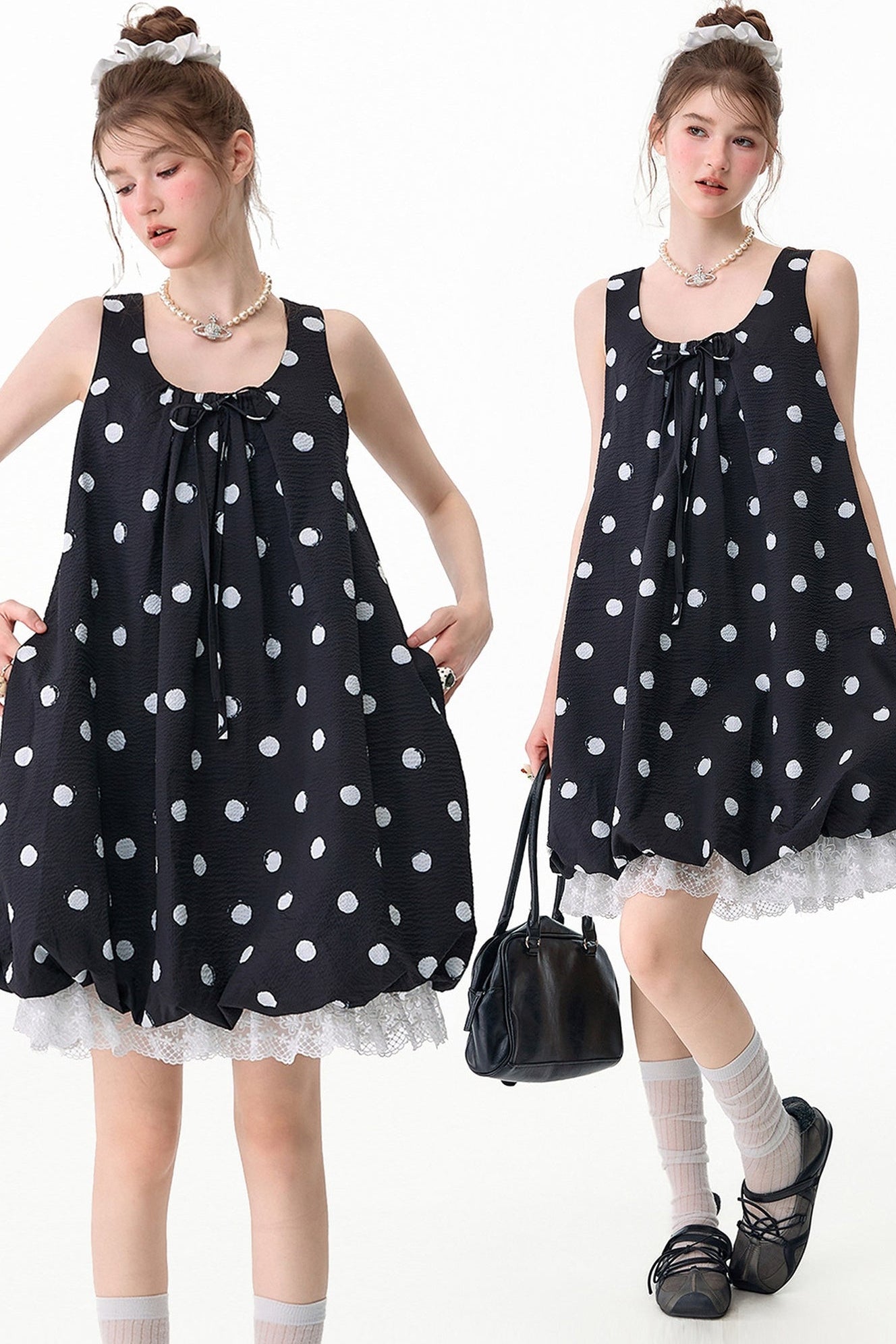 Schwarzes ärmelloses Kleid mit Punkten